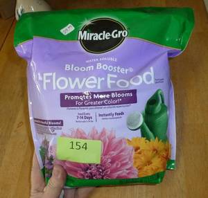 lot 154 image: THREE bags of Micracle Gro Flower Food 5 lb bags