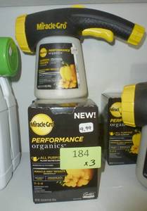 lot 184 image: Miracle Gro spray kit plus 2 boxes of fertilizer