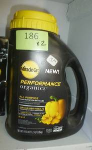lot 186 image: 2 Miracle Gro 2.5 lb bottles of granular fertilizer