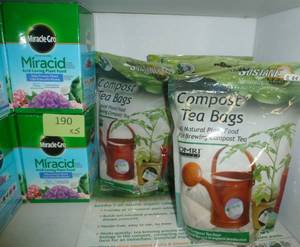 lot 190 image: 2 boxes of Miracid and 3 bags of compost tea bags