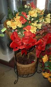 lot 206 image: Iron plant stand with silk flowers, planter and wicker basket of pine cones