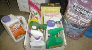 lot 223 image: box of partially used chemicals, mosquito beater and peat moss