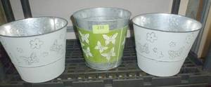 lot 233 image: THREE metal planters with butterflies
