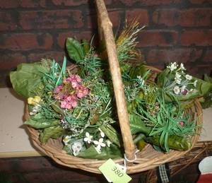 lot 380 image: Wicker Basket full of small arrangements ready to put in a small planter