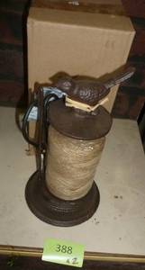 lot 388 image: TWO cast iron holders for Twine with scissor