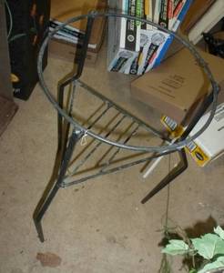 lot 393 image: TWO metal plant stands 23 inches tall 12 inch diameter