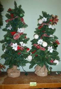lot 399 image: Two decorated and lit christmas trees 33 inches tall