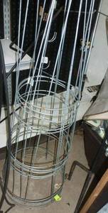 lot 408 image: THREE tomato cages and a bunch of hangers