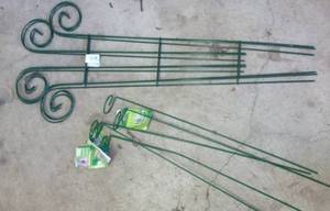lot 434 image: FIVE trellis, 5 plant holders and a tall 3 ft wicker and wood planter