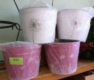 lot 444 image: FOUR metal fun design planters