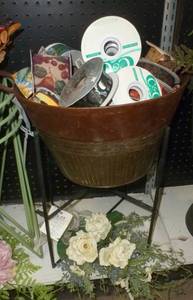 lot 456 image: Metal planter full of ribbon with stand