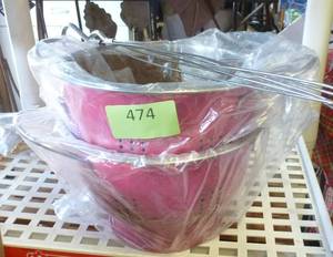 lot 474 image: TWO cute hot pink colander style hanging planters with coco liners
