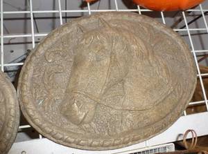 lot 479 image: Two horse wall hangings or stepping stones and Deer netting