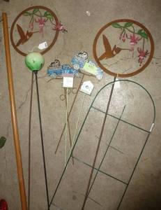 lot 480 image: Group of plant and garden stakes and a small rake