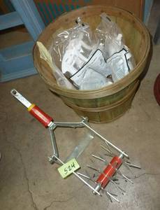 lot 524 image: Weedercultivator and a basket of spray nozzles