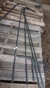 lot 555 image: 6 shepherds hooks laying on the pallets