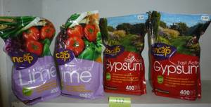 lot 113 image: THREE bags lime, 2 bags Gypsum