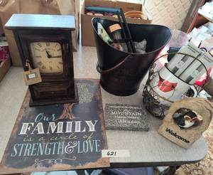 lot 621 image: New vintage look clock, planters, signs, rotating ornament hangers