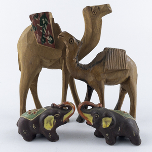 lot 84 image: Group of 4 Hand Painted Camel and Elephant Wood Figurines