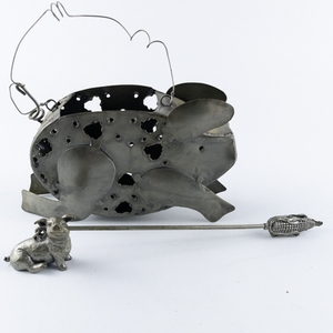 lot 85 image: Vintage Metal Pig Candle Snuffer & Openwork Pig Candle Holder