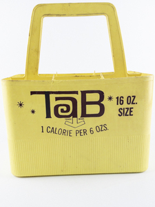 lot 112 image: Vintage Coca-Cola Co. TAB Yellow Soda Bottle Plastic Carrier