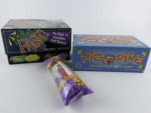 lot 142F image: GAMES -Pig Pile, Fart & Pez Candy Dispenser