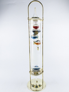 lot 13 image: Vintage 16.5 Colorful Floating Glass Thermometer with Brass Stand