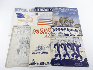 lot 183 image: Group of 5 Patriotic Piano Sheet Music - The Caissons Go Rolling Along, The Marines Hymn