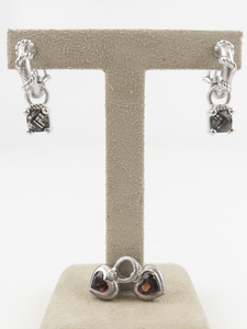 lot 6 image: Judith Ripka Twisted Rope Sterling Silver Omega Back Hoop Earrings With Red Cz Heart & Smokey Topaz Drop Charms.