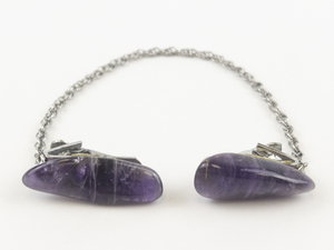 lot 11 image: Vintage Polished Amethyst silver tone base metal Sweater Clips.
