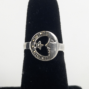 lot 41 image: Marcasite Accented Cresent Moon Sterling Silver Ring. (Missing 1 Marcasite). Size 6.75 - 7.