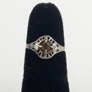 lot 55 image: Orange Rhinestone Sterling Silver Pinky Ring. Size 4.5 - 4.75.