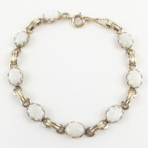 lot 67 image: Simulated Opal Gold Filled Tennis Bracelet.