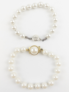 lot 70 image: Set of Two  Simulated Pearl Bead Bracelets . Knotted.