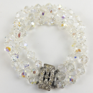 lot 73 image: Crystal Aurora Borealis Base Metal Three Strand Beaded Bracelet.