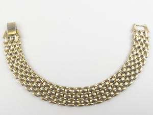 lot 77 image: Panther Link Gold Tone Base Metal Bracelet.