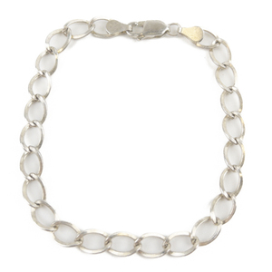 lot 83 image: Oval Link Sterling Silver Charm Bracelet.