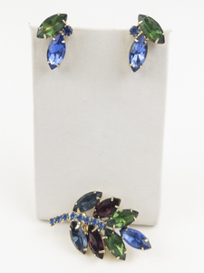 lot 103 image: Multi-Colored Rhinestone Gold Tone Base Metal Clip-On Earrings & Brooch.