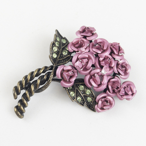 lot 117 image: AVON Vintage Pink Roses Bronze Base Metal Brooch .
