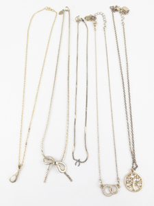 lot 167 image: Group of 5  Gold Tone Base Metal Pendant Necklaces.