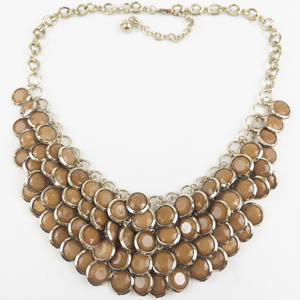 lot 175 image: Chocolate Drip Gold Tone Base Metal Statement Necklace.
