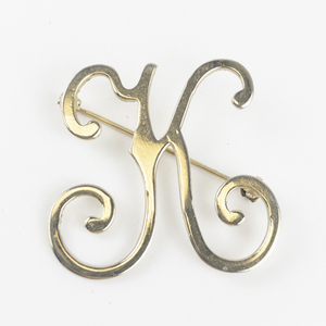 lot 128 image: Initial Monogram K Gold Tone Base Metal Brooch .