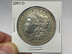 lot 97 image: 1897-O Morgan Silver Dollar