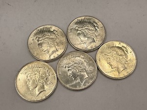 lot 6 image: Bag of 5 Bright Silver Peace Dollars