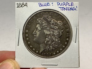 lot 9 image: 1884 Morgan Silver Dollar