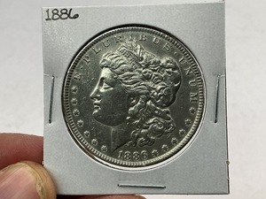 lot 25 image: 1886 Morgan Silver Dollar