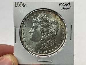 lot 26 image: 1886 Morgan Silver Dollar