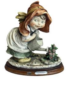 lot 2 image: Vintage 1981 G. Armani Watering the Roses Figurine (7 Tall)