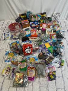 lot 10 image: Huge Lot of Vintage Sealed McDonalds, Burger King, Hardees Toys - Pokemon, Harry Potter, Pink Panther and More