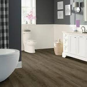 lot 13 image: 36 Boxes of TrafficMaster Grey Ash 4 MIL x 6 in. W x 36 in. L Peel and Stick Water Resistant Vinyl Plank Flooring (36 sqftcase)  Customer Returns See Pictures